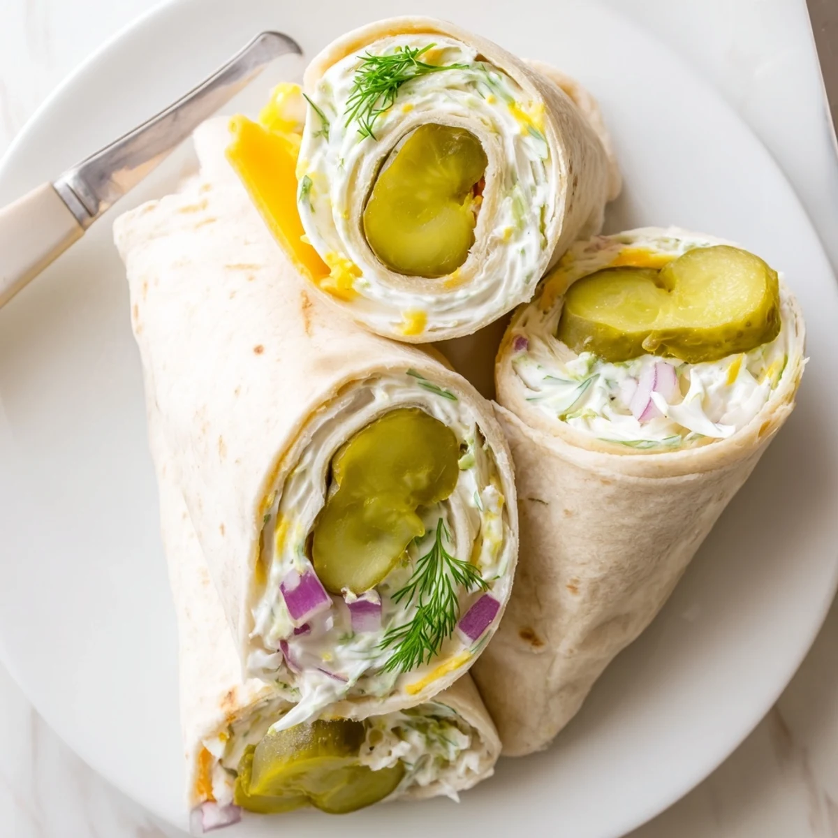 Fun, flavorful Pickle-in-a-Blanket ready to impress guests at gatherings and picnics.