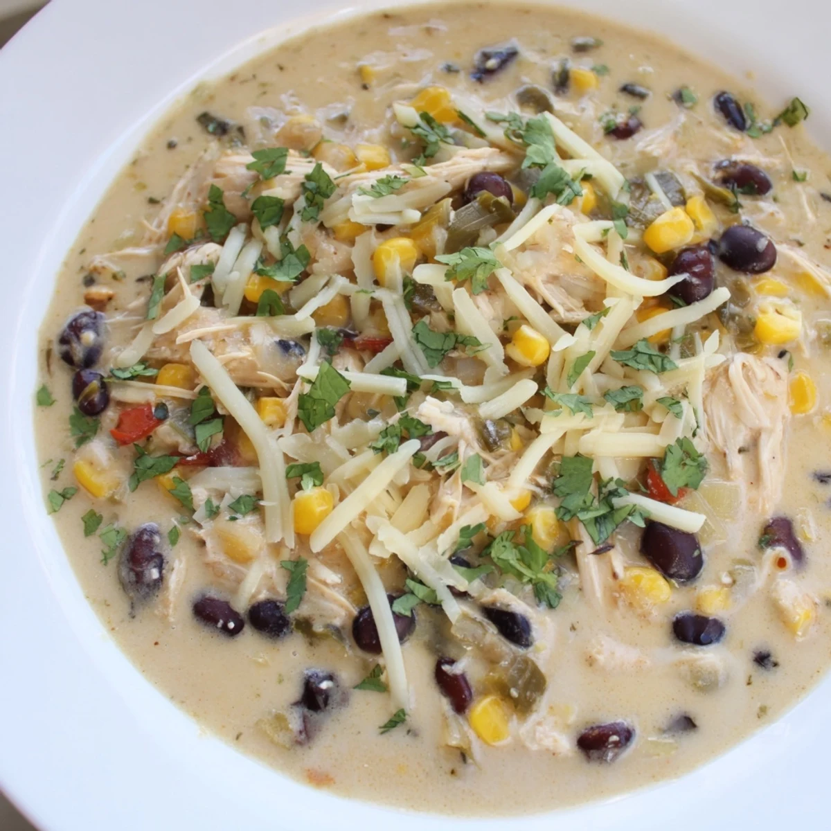 This flavorful Chicken Poblano Soup, rich with vegetables, is perfect for a quick and easy weeknight meal.