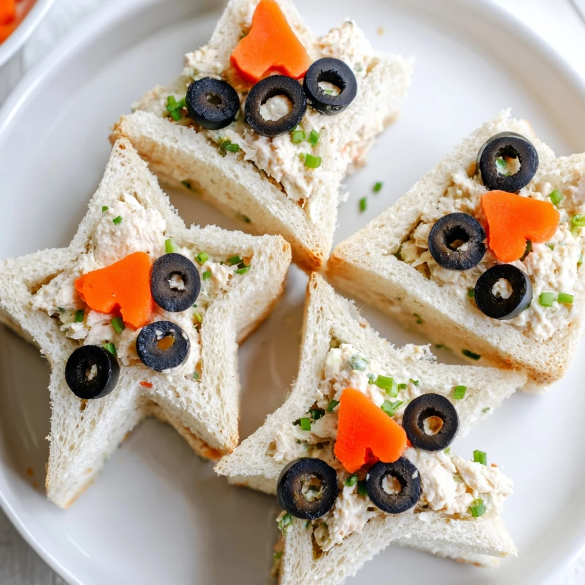 Freshly assembled Mini Starfish Sandwiches shaped like stars, perfect for a kids' party, ready to enjoy.