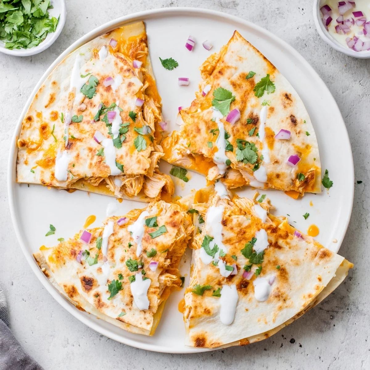 Golden-brown Buffalo Chicken Quesadilla, bursting with melted cheese and spicy chicken filling.