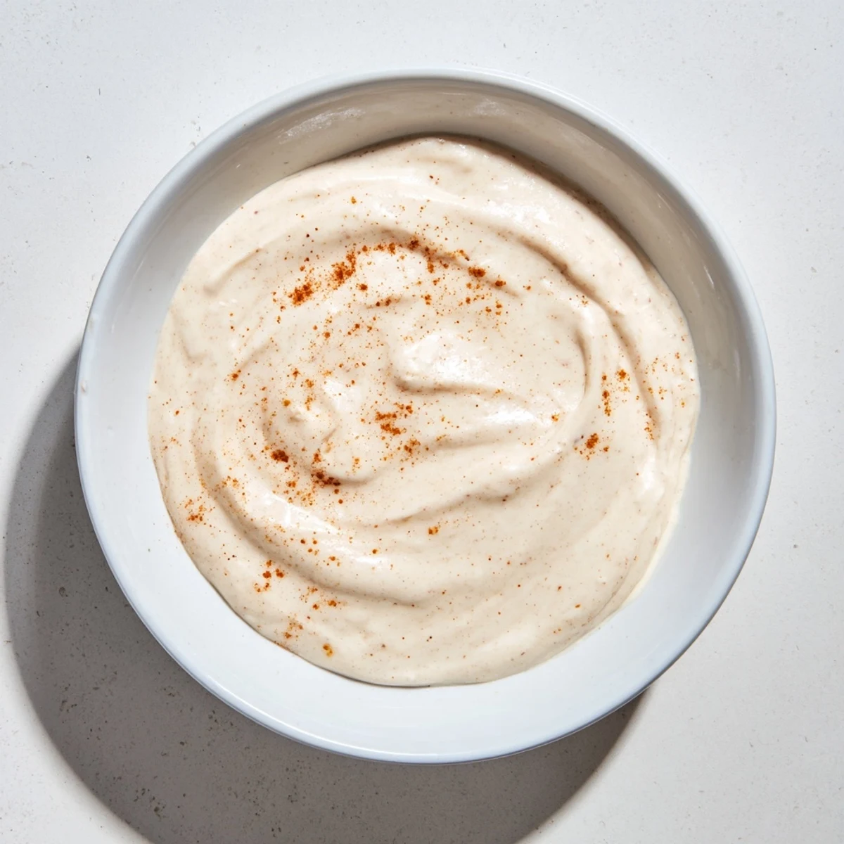 A visually inviting photo of Greek Yogurt Fruit Dip, perfect as a snack with juicy red strawberries.