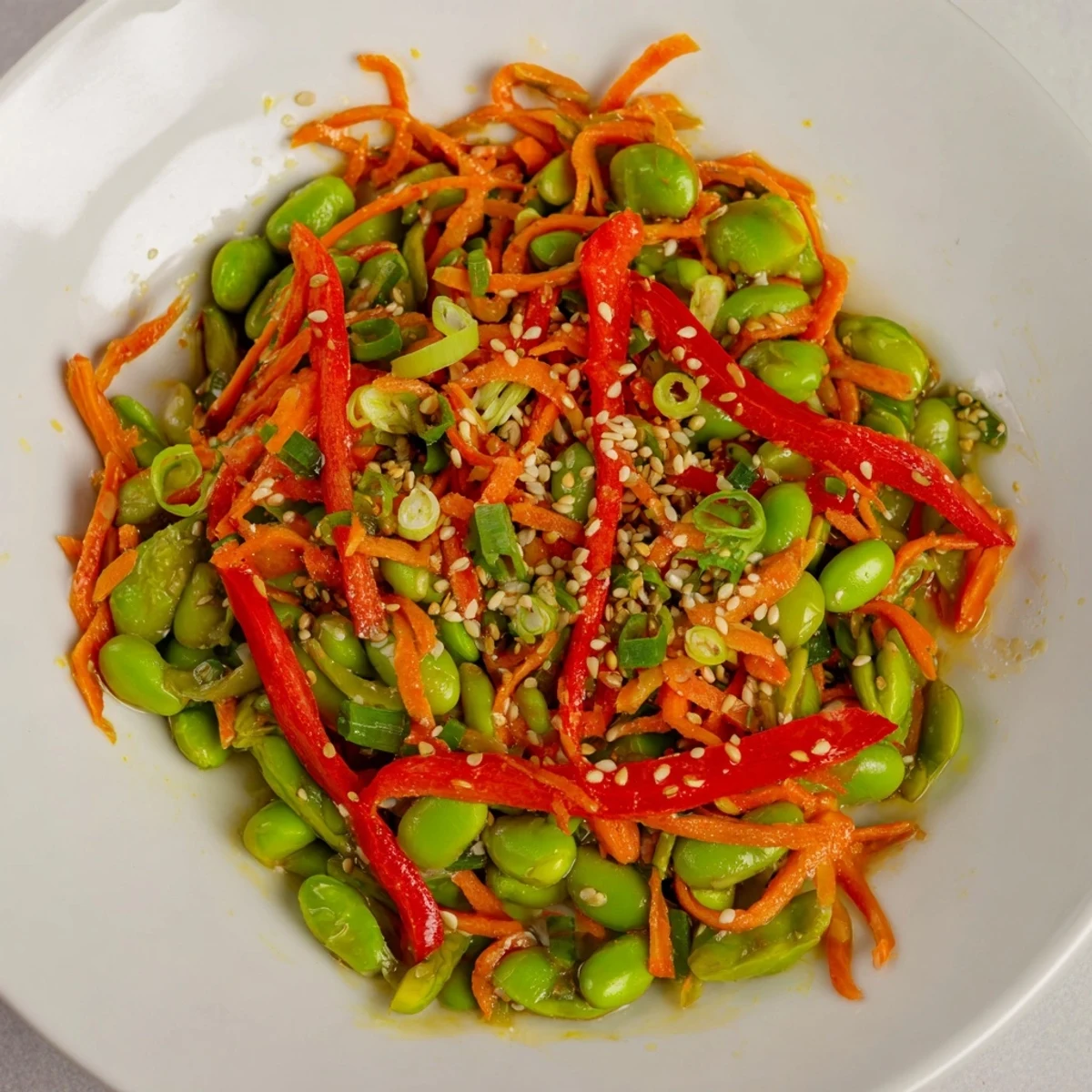 Freshly tossed Asian Edamame Salad, bursting with flavor, perfect for a quick and healthy lunch or dinner.
