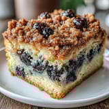 Tangy lemon zest and juicy blueberries shine in these moist sourdough coffee cake squares, topped with a buttery cinnamon streusel.  