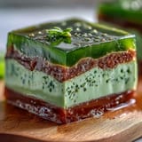Elegant two-tone yokan with a rich red bean layer topped by fragrant matcha jelly, showcasing classic Japanese confectionery artistry.