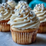 Beautiful celestial Cancer birthday cupcakes showcasing pearlized fondant art, perfect for parties.