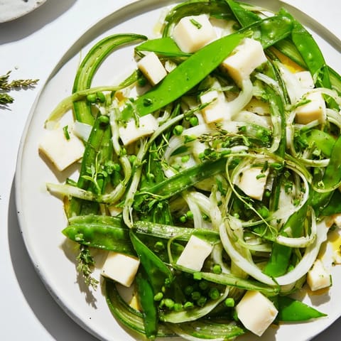 Fresh, crisp The English Ivy salad: vibrant greens intertwined with sharp cheddar and chives.