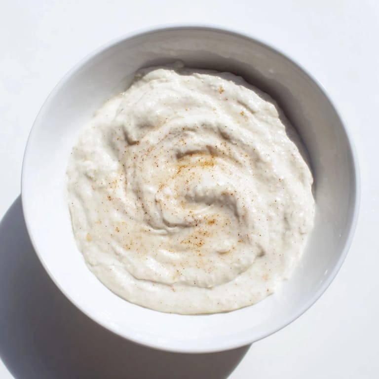 This vibrant bowl of Greek Yogurt Fruit Dip is bursting with lemon zest and sweet honey flavors.