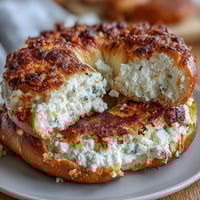 Soft, chewy cottage cheese protein bagels with golden crust, perfect for a high-protein breakfast or snack.  