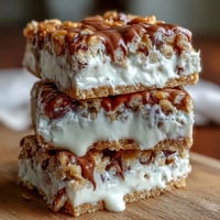 Decadent clotted cream cookie bars with white chocolate, rich and buttery, perfect for an indulgent dessert or tea-time treat.