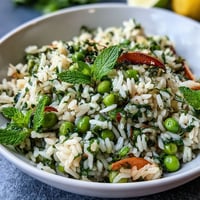 Fresh Spring Pea and Mint Rice Pilaf with vibrant green peas and aromatic mint, a perfect light side dish for spring meals.